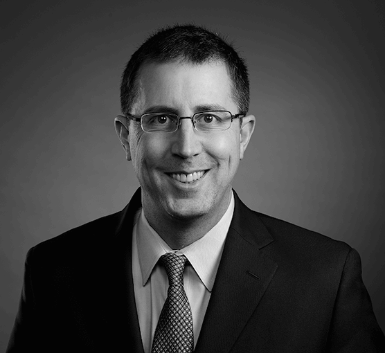 Black and white headshot of Dominic Allocco