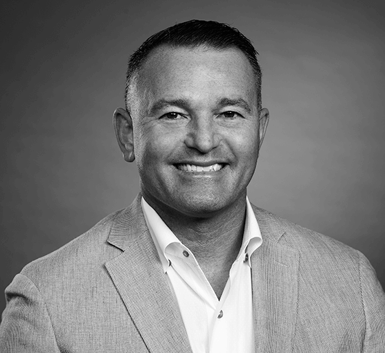 Black and white headshot of Rich Maher