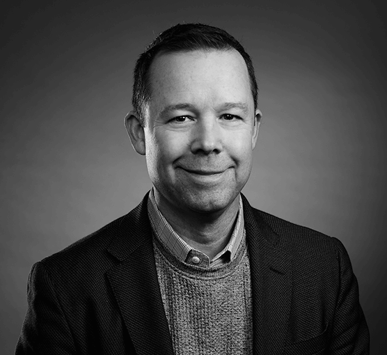 Black and white headshot of Rob Barmann