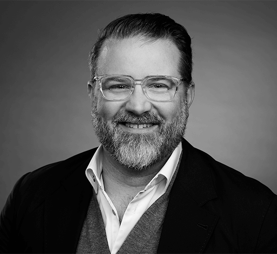 Black and white headshot of Scott Shadiow