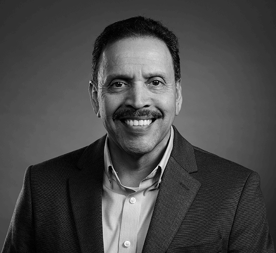 Black and white headshot of Virgil Aguirre