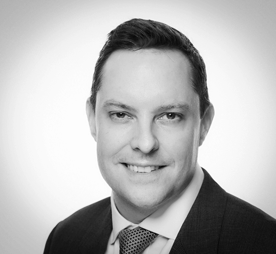 Black and white headshot image of Kieran Murphy